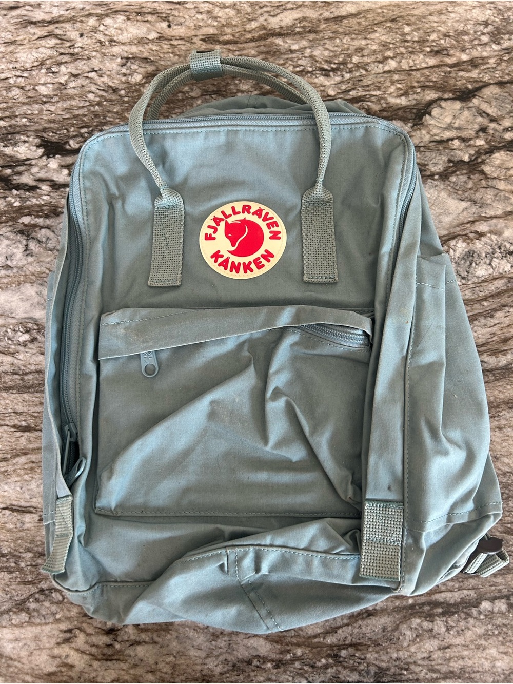 Fjallraven Kanken Backpack in Sage Green with Red Logo